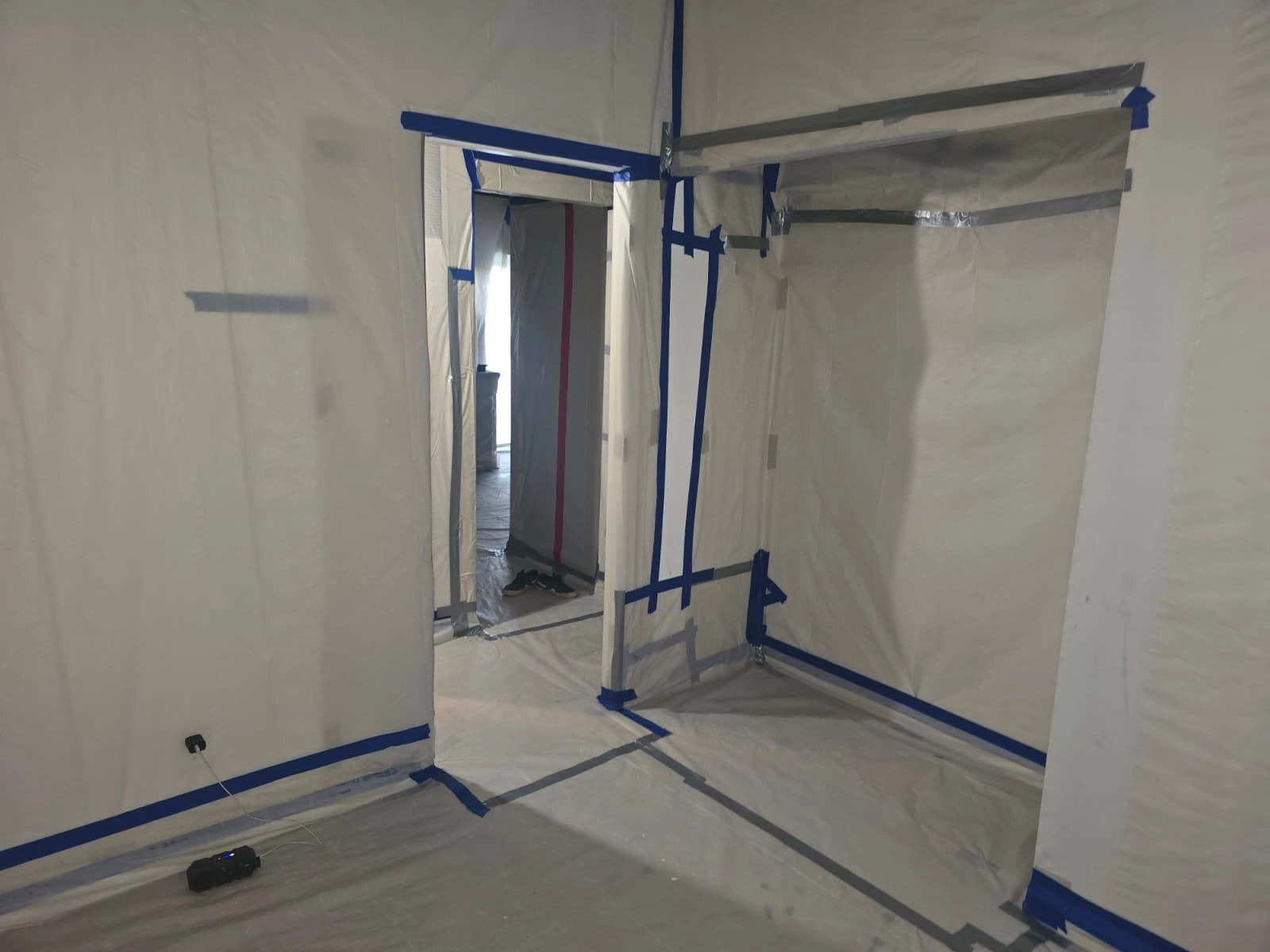 Licensed asbestos abatement crew working safely on a residential project in Odenton, MD